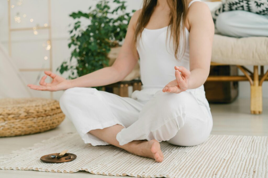 Photo by Mikhail Nilov: https://www.pexels.com/photo/a-woman-sitting-on-the-floor-rug-6943892/